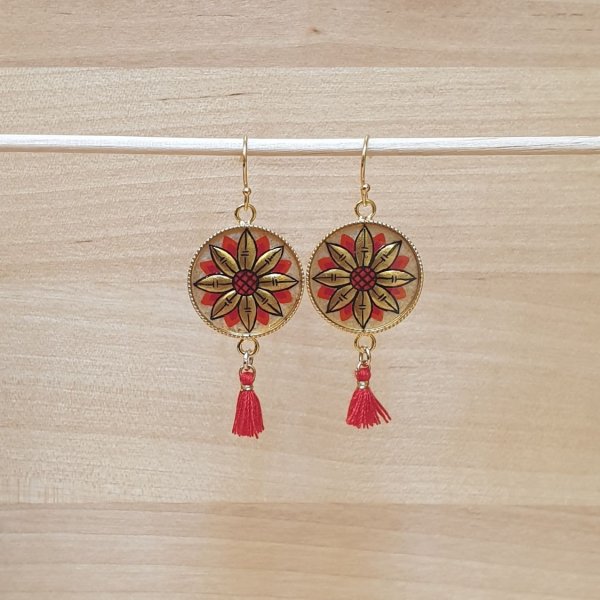 Guld/bl&aring; blomma &ouml;rh&auml;ngen