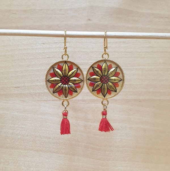 Guld/bl&aring; blomma &ouml;rh&auml;ngen