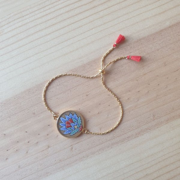 Bracelet r&eacute;glable enluminure fleur orientale bleue