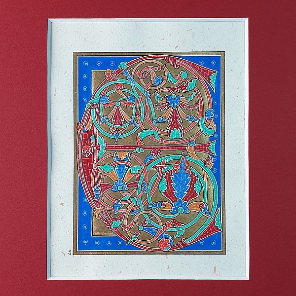 Bokstaven E i tidig gotisk stil, med ljus.