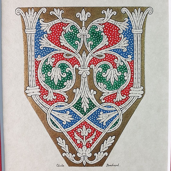 Bokstaven V i romansk stil, med ljus.