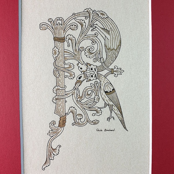 Bokstaven R i romansk stil med ljusskrift