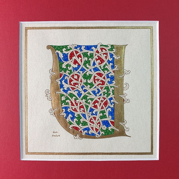 Bokstaven U i romansk stil, med ljus.