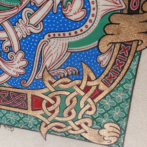 Bokstaven D i romansk stil med ljusskrift