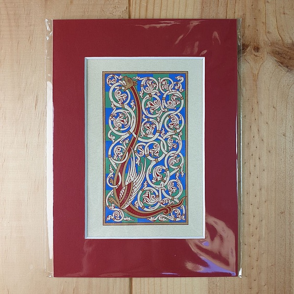 Bokstaven L i romansk stil, med ljus.