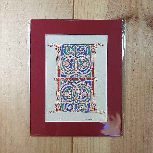 Bokstaven H i romansk stil, med ljus.