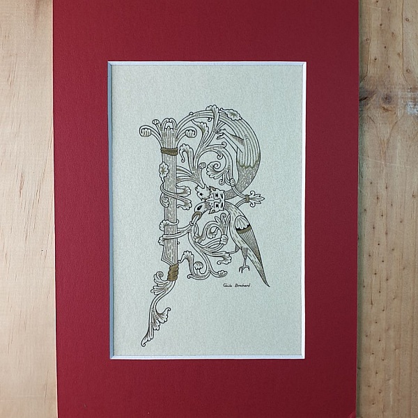 Bokstaven R i romansk stil med ljusskrift