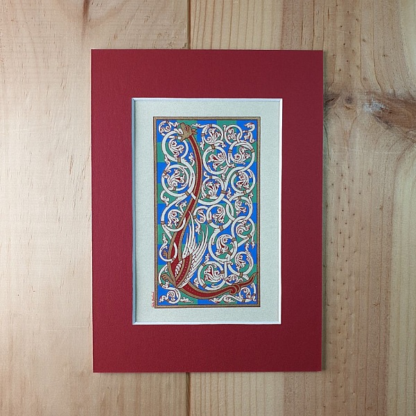 Bokstaven L i romansk stil, med ljus.