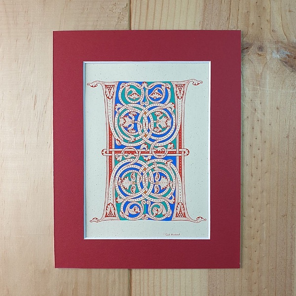 Bokstaven H i romansk stil, med ljus.