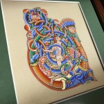 Romanesque illuminated bokstav U inramad