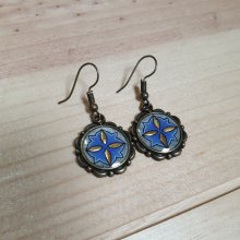 Guld/blå upplysta hängande örhängen i guld/blått